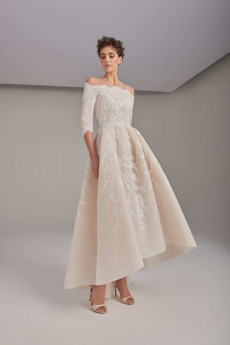 Lace embroidered box-pleated gown
