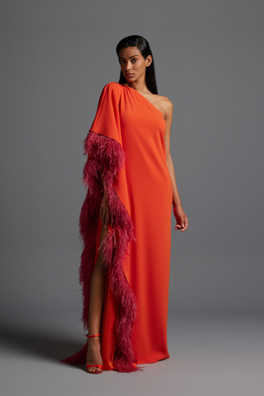One shoulder pleated crepe gown with feathers sleeves
